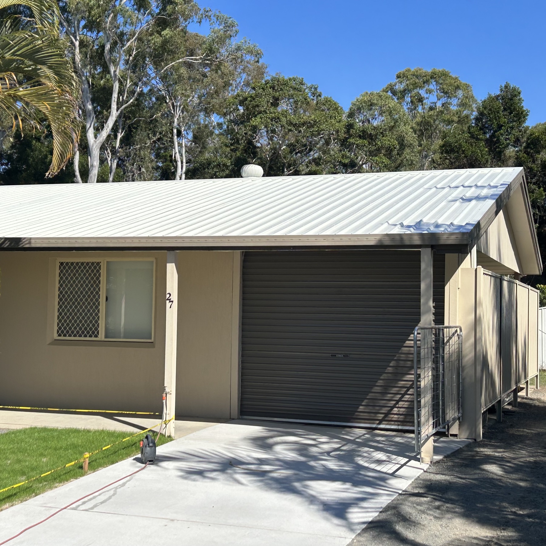 Modern home with grey Colorbond roof